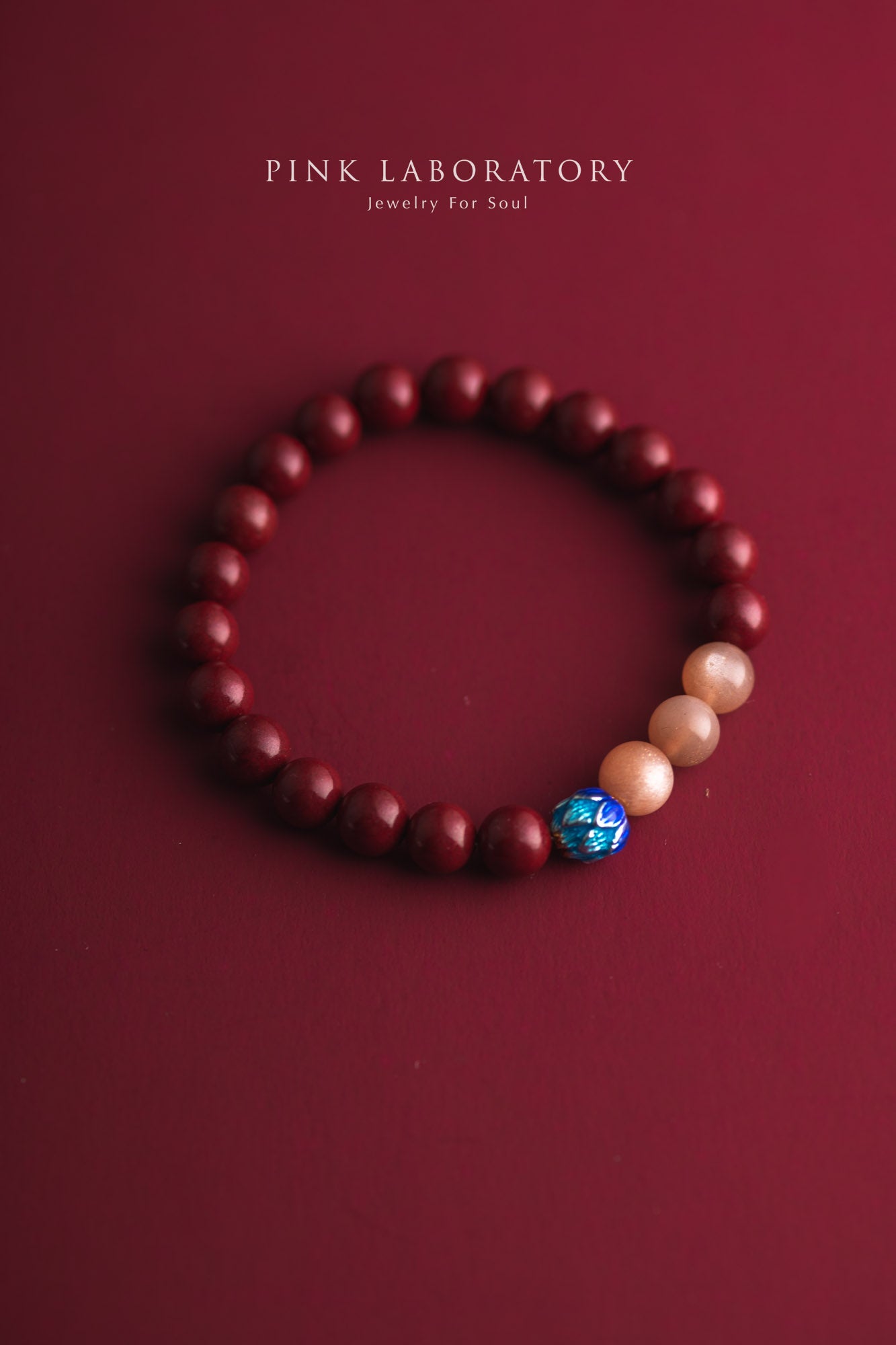 硃砂橙月光石925純銀手鍊 8mm