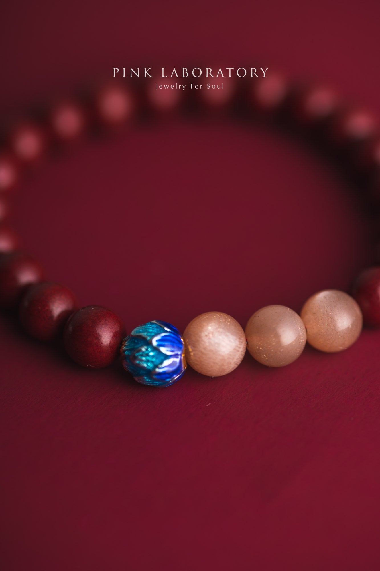 硃砂橙月光石925純銀手鍊 8mm